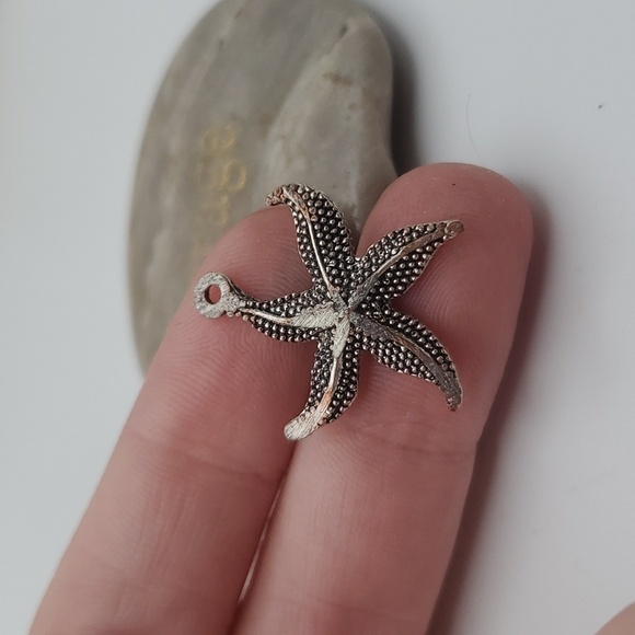 Surfing intricate starfish‎ charm